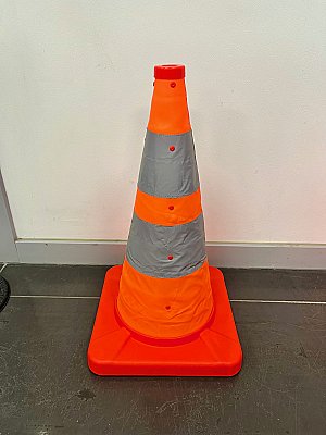 Oranje uittrekbare harmonicakegel met intern LED-lampje